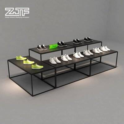Black high and low iron shoes display table